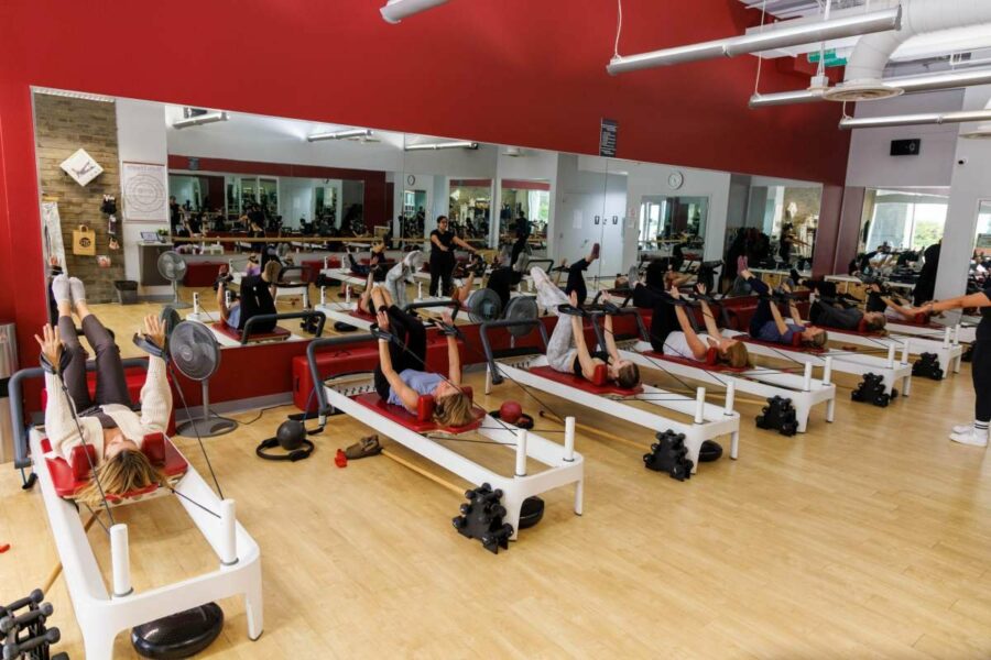 beginners in DC reformer Pilates class