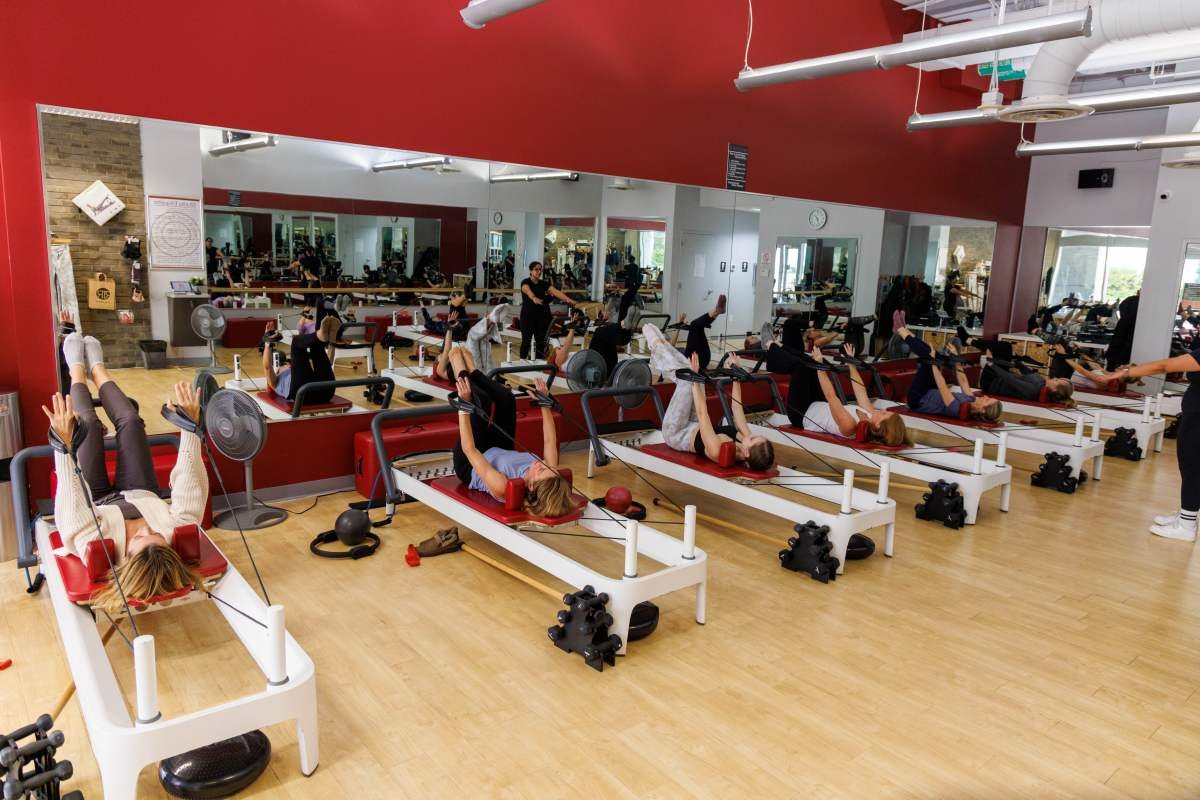 beginners in DC reformer Pilates class