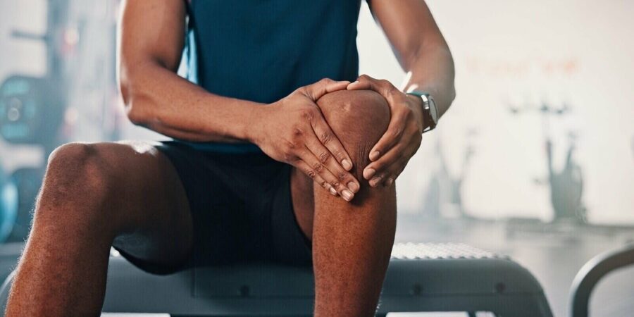 knee pain and man with fitness, leg injury and athlete with orthopedic issue or fibromyalgia emergency